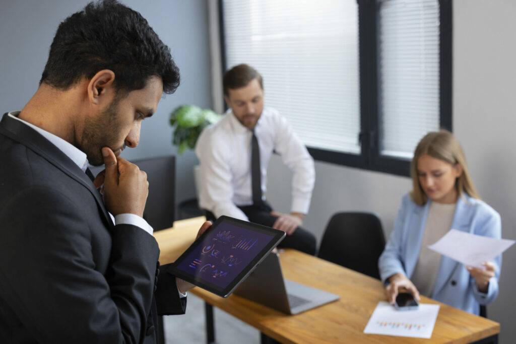 Business professional analyzing finance graphs